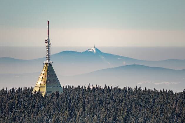 A view of Radio and television transmitter on Black Mountain in the Krkonose Mountains, front, and Jested mountain hotel and television tower by famous Czechoslovak architect Karel Hubacek in Liberec, Czech Republic. (CTKxPhoto JirixCastka) CTKPhotoF201702180849501 