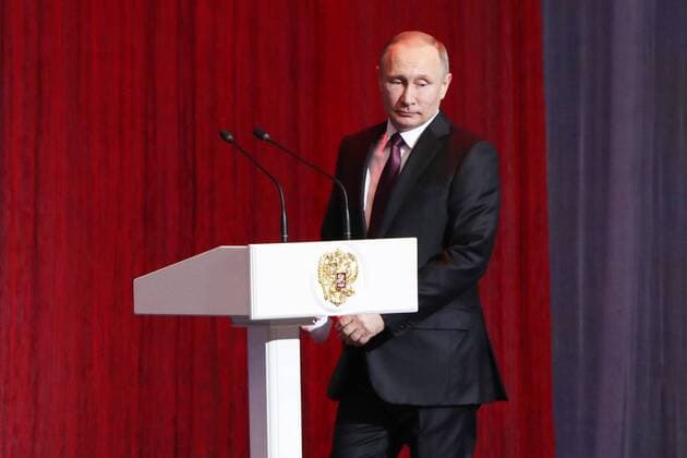 MOSCOW, RUSSIA - FEBRUARY 23, 2017: Russiaâ€™s President Vladimir Putin attends a concert marking Defender of the Fatherland Day at Moscowâ€™s Kremlin. Vyacheslav Prokofyev TASS  TS042584