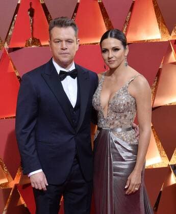 Luciana Barroso (L) and actor Matt Damon arrive on the red carpet for the 89th annual Academy Awards at the Dolby Theatre in the Hollywood section of Los Angeles on February 26, 2017.  LAP20170226671 JIMxRUYMEN