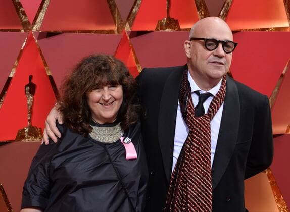Director Gianfranco Rosi and producer Donatella Palermo arrive on the red carpet for the 89th annual Academy Awards at the Dolby Theatre in the Hollywood section of Los Angeles on February 26, 2017.  LAP20170226870 JIMxRUYMEN