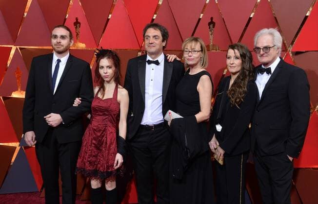 Sound editor Sylvain Bellemare (C) arrives on the red carpet for the 89th annual Academy Awards at the Dolby Theatre in the Hollywood section of Los Angeles on February 26, 2017.  LAP20170226425 JIMxRUYMEN