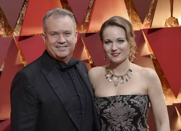 Visual effects artist Neil Corbould (L) and guest arrive on the red carpet for the 89th annual Academy Awards at the Dolby Theatre in the Hollywood section of Los Angeles on February 26, 2017.  LAP20170226441 JIMxRUYMEN