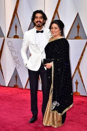 Dev Patel and his mother Anita arrive on the red carpet for the 89th annual Academy Awards at the Dolby Theatre in the Hollywood section of Los Angeles on February 26, 2017.  LAP2017022839 KEVINxDIETSCH