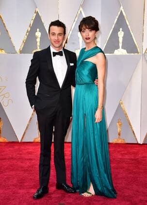 Justin Hurwitz and his guest arrive on the red carpet for the 89th annual Academy Awards at the Dolby Theatre in the Hollywood section of Los Angeles on February 26, 2017.  LAP2017022842 KEVINxDIETSCH