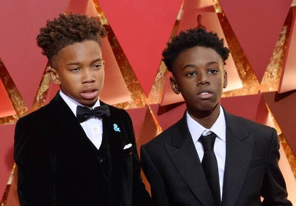 Actors Jaden Piner (L) and Alex R. Hibbert arrive on the red carpet for the 89th annual Academy Awards at the Dolby Theatre in the Hollywood section of Los Angeles on February 26, 2017.  LAP20170226461 JIMxRUYMEN
