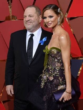 Producer Harvey Weinstein (L) and designer Georgina Chapman arrive on the red carpet for the 89th annual Academy Awards at the Dolby Theatre in the Hollywood section of Los Angeles on February 26, 2017.  LAP20170226094 JIMxRUYMEN