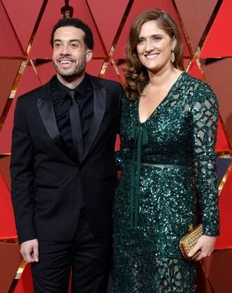 Director Ezra Edelman (L) and producer Caroline Waterlow arrive on the red carpet for the 89th annual Academy Awards at the Dolby Theatre in the Hollywood section of Los Angeles on February 26, 2017.  LAP20170226993 JIMxRUYMEN