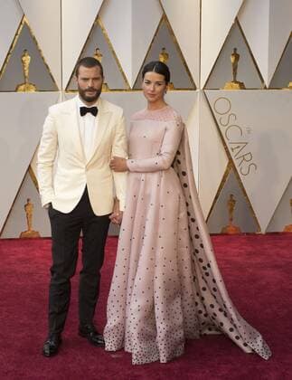 British pianist and singer Amelia Warner (R) and actor Jamie Dornan pose at the red carpet during the 89th Academy Awards at the Dolby Theater in Hollywood, California, United States, 26 February 2017. 89TH CINEMA ACADEMY AWARDS IN HOLLYWOOD !ACHTUNG: NUR REDAKTIONELLE NUTZUNG!  Copyright: xARMANDOxARORIZOx HWD001 20170227-636237710044883951