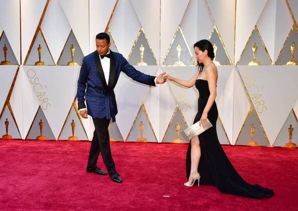 Terrence Howard and Mira Pak arrive on the red carpet for the 89th annual Academy Awards at the Dolby Theatre in the Hollywood section of Los Angeles on February 26, 2017.  LAP2017022868 KEVINxDIETSCH