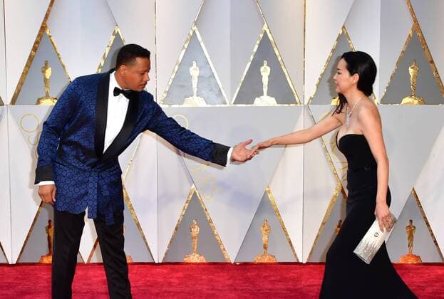 Terrence Howard and Mira Pak arrive on the red carpet for the 89th annual Academy Awards at the Dolby Theatre in the Hollywood section of Los Angeles on February 26, 2017.  LAP2017022870 KEVINxDIETSCH