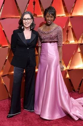 Donna Gigliott (L) and guest arrive on the red carpet for the 89th annual Academy Awards at the Dolby Theatre in the Hollywood section of Los Angeles on February 26, 2017.  LAP20170226476 JIMxRUYMEN