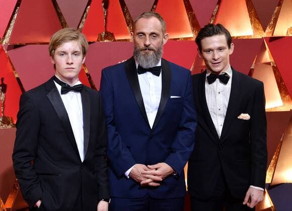 (L-R) Louis Hofmann, Roland Moller and Joel Basman arrive on the red carpet for the 89th annual Academy Awards at the Dolby Theatre in the Hollywood section of Los Angeles on February 26, 2017.  LAP20170226482 JIMxRUYMEN
