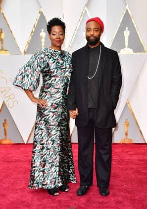 Cinematographer Bradford Young (R) arrives on the red carpet for the 89th annual Academy Awards at the Dolby Theatre in the Hollywood section of Los Angeles on February 26, 2017.  LAP2017022894 KEVINxDIETSCH