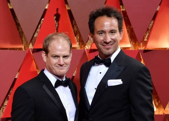 Stephen Ellis (L) and Marcel Mettelsiefen arrive on the red carpet for the 89th annual Academy Awards at the Dolby Theatre in the Hollywood section of Los Angeles on February 26, 2017.  LAP20170226485 JIMxRUYMEN