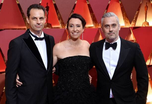 (L-R) Emile Sherman, Angie Fielder and Iain Cannin arrive on the red carpet for the 89th annual Academy Awards at the Dolby Theatre in the Hollywood section of Los Angeles on February 26, 2017.  LAP20170226486 JIMxRUYMEN