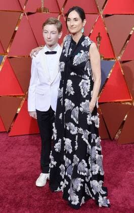 Producer Carla Hacken (R) and Beau Gallagher-Hacken arrive on the red carpet for the 89th annual Academy Awards at the Dolby Theatre in the Hollywood section of Los Angeles on February 26, 2017.  LAP20170226493 JIMxRUYMEN