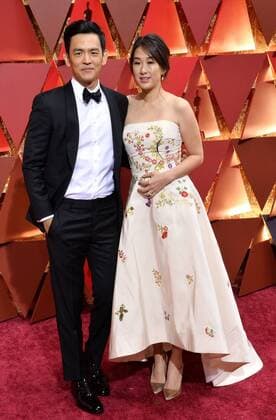 Actor John Cho (L) and Kerri Higuchi arrive on the red carpet for the 89th annual Academy Awards at the Dolby Theatre in the Hollywood section of Los Angeles on February 26, 2017.  LAP20170226500 JIMxRUYMEN