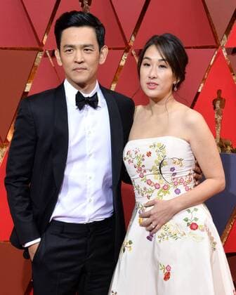 Actor John Cho (L) and Kerri Higuchi arrive on the red carpet for the 89th annual Academy Awards at the Dolby Theatre in the Hollywood section of Los Angeles on February 26, 2017.  LAP20170226501 JIMxRUYMEN