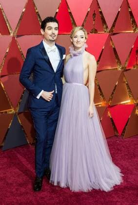 (170227) -- LOS ANGELES, Feb. 26, 2017 -- Director Damien Chazelle(L) and actress Olivia Hamilton arrive for the red carpet of the 89th Academy Awards at the Dolby Theater in Los Angeles, the United States, on Feb. 26, 2017. )(gj) U.S.-LOS ANGELES-OSCAR-RED CARPET YangxLei 