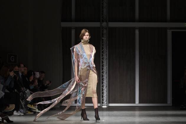 A model presents a creation of Chinese designer brand RICOSTRU during Milan Fashion Week Fall Winter 2017 2018 in Milan, Italy on Feb. 27, 2017. ) ITALY-MILAN-FASHION WEEK-RICOSTRU JinxYu 