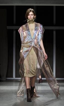 A model presents a creation of Chinese designer brand RICOSTRU during Milan Fashion Week Fall Winter 2017 2018 in Milan, Italy on Feb. 27, 2017. ) ITALY-MILAN-FASHION WEEK-RICOSTRU JinxYu 