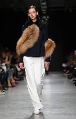 A model takes to the catwalk during the presentation of Guy Laroche show as part of the Fall-Winter 2017-18 Paris Fashion Week on March 1, 2017.  PAR20170301122 MAYAxVIDON-WHITE