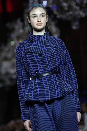 A model takes to the catwalk during the presentation of Issey Miyake s show as part of the Fall-Winter 2017-18 Paris Fashion Week on March 3, 2017.  PAR20170303109 MAYAxVIDON-WHITE