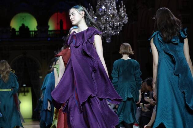 A model takes to the catwalk during the presentation of Issey Miyake s show as part of the Fall-Winter 2017-18 Paris Fashion Week on March 3, 2017.  PAR20170303102 MAYAxVIDON-WHITE