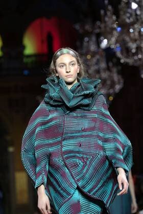 A model takes to the catwalk during the presentation of Issey Miyake s show as part of the Fall-Winter 2017-18 Paris Fashion Week on March 3, 2017.  PAR20170303115 MAYAxVIDON-WHITE