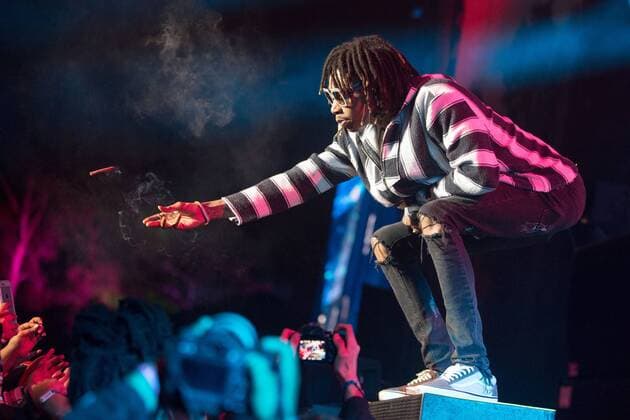 March 3, 2017 - Okeechobee, Florida, U.S - WIZ KHALIFA (CAMERON JIBRIL THOMAZ) tosses a lit joint to a fan at the Okeechobee Music Festival in Okeechobee, Florida Okeechobee U.S. - ZUMAs135 20170303_zap_s135_081 Copyright: xDanielxDeSloverx