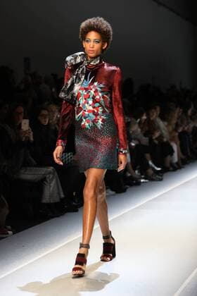 A model takes to the catwalk during the presentation of Leonard Paris show as part of the Fall-Winter 2017-18 Paris Fashion Week on March 6, 2017.  PAR20170306118 MAYAxVIDON-WHITE