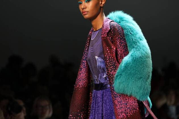 A model takes to the catwalk during the presentation of Leonard Paris show as part of the Fall-Winter 2017-18 Paris Fashion Week on March 6, 2017.  PAR20170306111 MAYAxVIDON-WHITE