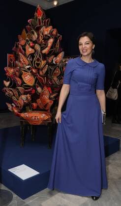 MOSCOW, RUSSIA - MARCH 6, 2017: Fashion designer Alisa Tolkacheva in front of Carla Tolomeo s Hermes chair (2004) displayed at the Silk Labyrinth. Rare Hermes scarves from Maison Carre Foundation collection exhibition at Moscow s All-Russian Decorative Art Museum. VyacheslavProkofyev TASS  TS043856