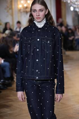 A model takes to the catwalk during the presentation of Paul & Joe s show as part of the Fall-Winter 2017-18 Paris Fashion Week on March 7, 2017.  PAR20170307110 MAYAxVIDON-WHITE