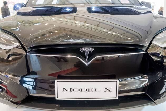 March 9, 2017 - Shanghai, Shanghai, China - Shanghai, CHINA-March 9 2017: (EDITORIAL USE ONLY. CHINA OUT)..A black Tesla Model X shows at a shopping mall in Shanghai, March 9th, 2017. The Tesla Model X is a full-sized, all-electric, luxury, crossover SUV made by Tesla Inc. that uses falcon wing doors for access to the second and third row seats. Shanghai China  - ZUMAs145 20170309_zaa_s145_091 Copyright: xWangxGangx