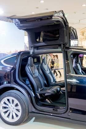 March 9, 2017 - Shanghai, Shanghai, China - Shanghai, CHINA-March 9 2017: (EDITORIAL USE ONLY. CHINA OUT)..A black Tesla Model X shows at a shopping mall in Shanghai, March 9th, 2017. The Tesla Model X is a full-sized, all-electric, luxury, crossover SUV made by Tesla Inc. that uses falcon wing doors for access to the second and third row seats. Shanghai China  - ZUMAs145 20170309_zaa_s145_096 Copyright: xWangxGangx
