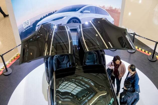 March 9, 2017 - Shanghai, Shanghai, China - Shanghai, CHINA-March 9 2017: (EDITORIAL USE ONLY. CHINA OUT)..A black Tesla Model X shows at a shopping mall in Shanghai, March 9th, 2017. The Tesla Model X is a full-sized, all-electric, luxury, crossover SUV made by Tesla Inc. that uses falcon wing doors for access to the second and third row seats. Shanghai China  - ZUMAs145 20170309_zaa_s145_098 Copyright: xWangxGangx