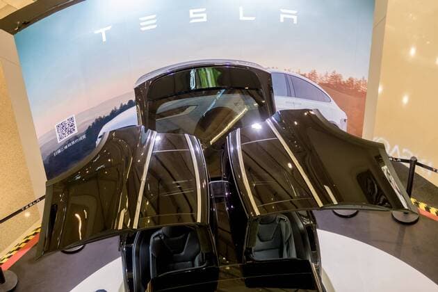 March 9, 2017 - Shanghai, Shanghai, China - Shanghai, CHINA-March 9 2017: (EDITORIAL USE ONLY. CHINA OUT)..A black Tesla Model X shows at a shopping mall in Shanghai, March 9th, 2017. The Tesla Model X is a full-sized, all-electric, luxury, crossover SUV made by Tesla Inc. that uses falcon wing doors for access to the second and third row seats. Shanghai China  - ZUMAs145 20170309_zaa_s145_100 Copyright: xWangxGangx