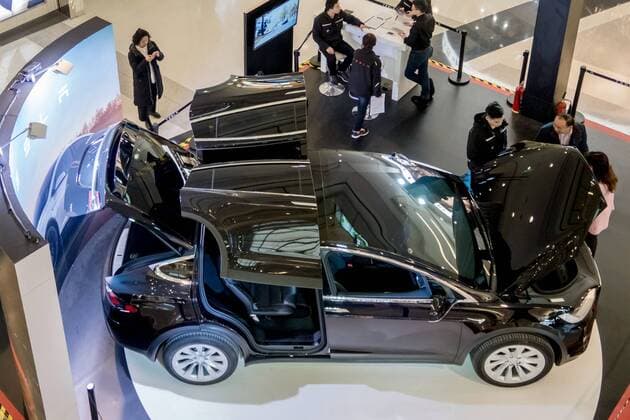 March 9, 2017 - Shanghai, Shanghai, China - Shanghai, CHINA-March 9 2017: (EDITORIAL USE ONLY. CHINA OUT)..A black Tesla Model X shows at a shopping mall in Shanghai, March 9th, 2017. The Tesla Model X is a full-sized, all-electric, luxury, crossover SUV made by Tesla Inc. that uses falcon wing doors for access to the second and third row seats. Shanghai China  - ZUMAs145 20170309_zaa_s145_102 Copyright: xWangxGangx