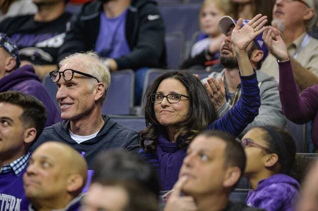 March 11, 2017 - Washington, DC, U.S - JULIA LOUIS-DREYFUS, sitting next to husband BRAD HALL, wave to the crowd during the semifinal game held at the Verizon Center in Washington, DC. Louis-Dreyfus is a Northwestern Alum and her son, Charles Hall, is a Freshman on the Northwestern basketball team. Washington U.S. - ZUMAs146 27586303sp Copyright: xAmyxSandersonx