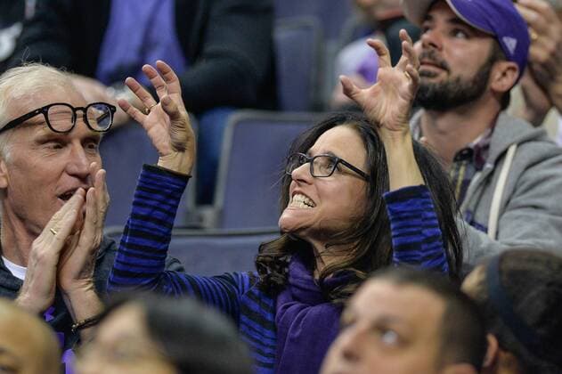March 11, 2017 - Washington, DC, U.S - JULIA LOUIS-DREYFUS, sitting next to husband BRAD HALL, makes a wildcat face at the camera for the big screen during the semifinal game held at the Verizon Center in Washington, DC. Louis-Dreyfus is a Northwestern Alum and her son, Charles Hall, is a Freshman on the Northwestern basketball team. Washington U.S. - ZUMAs146 27586304sp Copyright: xAmyxSandersonx