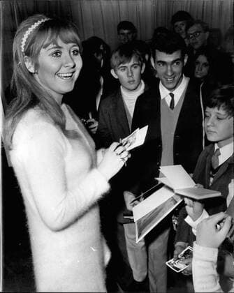 Dec. 12, 1968 - LULU - VOTED THE WORLD S TOP FEMALE SINGER HOLDS A CHRISTMAS FOR 150 FANS LULU - who is to represent Britain in the Eurovision song contest - and recently voted the world s top female singer, today gave a Christmas party for 150 fans at Manchester Square, London W.L. PHOTO SHOWS: Lulu, the 20-year-old singer from Glaegow, signs autograph. for some of the fan. who attended today Christmas party, - ZUMAk09_ 19681212_baf_k09_075 Copyright: xKeystonexPressxAgencyx