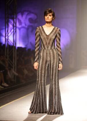 (170318) -- NEW DELHI, March 18, 2017 -- A model presents a creation of designer Namrata Joshipura during India Fashion Week Autumn-Winter 2017 in New Delhi, India, March 17, 2017. The four-day event is organised by the Fashion Design Council of India (FDCI), which kicked off on Wednesday at Jawaharlal Nehru Stadium, New Delhi. ) (zxj) INDIA-NEW DELHI-AMAZON FASHION WEEK-AUTUMN-WINTER 2017 Stringer 