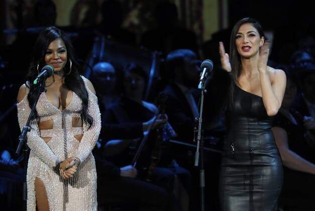 MOSCOW, RUSSIA - MARCH 18, 2017: American singers Ashanti (L) and Nicole Scherzinger at a ceremony to present BraVo international music awards at the Bolshoi Theatre. Mikhail Japaridze TASS  TS044C64