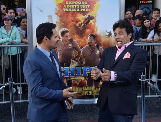Cast member Michael Pena (L) and actor Erik Estrada attend the premiere of the motion picture comedy CHIPS at TCL Chinese Theatre in the Hollywood section of Los Angeles on March 20, 2017. Storyline: A rookie officer is teamed with a hardened pro at the California Highway Patrol, though the newbie soon learns his partner is really an undercover Fed investigating a heist that may involved some crooked cops.  LAP2017032004 JIMxRUYMEN