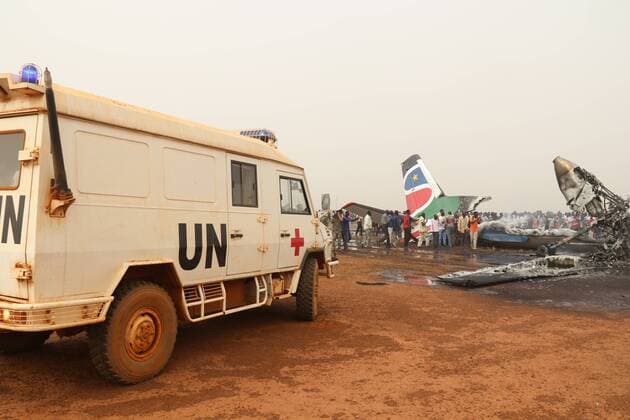 (170321) -- WAU (SOUTH SUDAN), March 21, 2017 () -- Ambulance of Chinese peacekeepers arrives at the site of a plane crash in Wau Airport, South Sudan, on March 20, 2017. All 43 passengers and six crew members have survived the plane crash that occurred in the northern South Sudan town of Wau on Monday afternoon, local authorities have confirmed. The airport is near the location of Chinese peacekeepers at Wau. After the accident, the Chinese peacekeepers hurried to the spot to help rescue people and put out the fire with water trucks. ( Zhou Xin) (zjy) SOUTH SUDAN-WAU-PLANE-CRASH Xinhua 