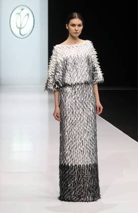 MOSCOW, RUSSIA - MARCH 21, 2017: A model showcases creations during a runway show for the Fall Winter 2017 pret-a-porter collection by Russian fashion designer Valentin Yudashkin at the 37th Moscow Fashion Week at Moscow s Gostiny Dvor Shopping and Exhibition Centre. Stanislav Krasilnikov TASS  TS045049