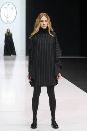 MOSCOW, RUSSIA - MARCH 21, 2017: A model showcases creations during a runway show for the Fall Winter 2017 pret-a-porter collection by Russian fashion designer Valentin Yudashkin at the 37th Moscow Fashion Week at Moscow s Gostiny Dvor Shopping and Exhibition Centre. Stanislav Krasilnikov TASS  TS045052