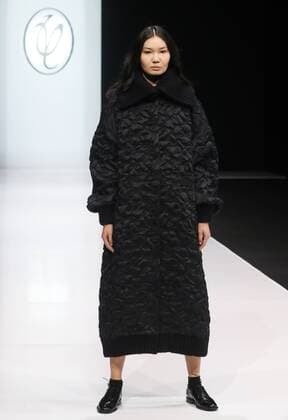 MOSCOW, RUSSIA - MARCH 21, 2017: A model showcases creations during a runway show for the Fall Winter 2017 pret-a-porter collection by Russian fashion designer Valentin Yudashkin at the 37th Moscow Fashion Week at Moscow s Gostiny Dvor Shopping and Exhibition Centre. Stanislav Krasilnikov TASS  TS04505A