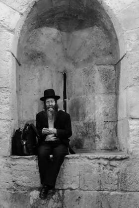 March 21, 2017 - Jerusalem, Israel - A Jewish orthodox man sits in an archway inside the Jaffa Gate as Sounds of the Old City music festival opens in Jerusalem offering a glimpse of diverse music traditions. Jerusalem Israel - ZUMAa126 20170321_zap_a126_013 Copyright: xNirxAlonx